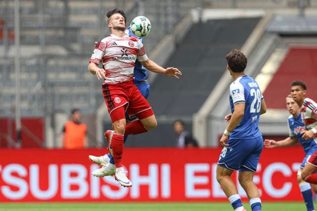Eric Hottmann (Fortuna Duesseldorf) und Valentin Laessig (TSG Hoffenheim II) im Zweikampf waehrend des Spiels der 3. Liga zwischen Fortuna Duesseldorf und TSG 1899 Hoffenheim II, Merkur Spiel-Arena am 15. August 2026 in Duesseldorf, Deutschland. (Foto von Oliver Kaelke DeFodi Images) +++ Eric Hottmann (Fortuna Duesseldorf) und Valentin Laessig (TSG Hoffenheim II) battle for the ball during the 3. Liga match between Fortuna Duesseldorf and TSG 1899 Hoffenheim II at Merkur Spiel-Arena on August 15, 2026 in Dusseldorf, Germany. (Photo by Oliver Kaelke DeFodi Images) DFB DFL REGULATIONS PROHIBIT ANY USE OF PHOTOGRAPHS AS IMAGE SEQUENCES AND OR QUASI-VIDEO. (Photo by Oliver Kaelke DeFodi Images) -