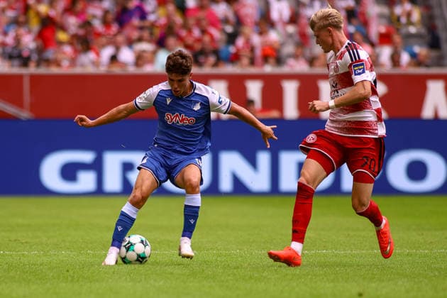 15.08.2026, GER, Fussball, Herren, 3. Liga , Saison 2026 2027, Fortuna Düsseldorf - TSG Hoffenheim II Matthew Moore (TSG II) und Felix Meiser (F95) im Kampf um den Ball Copyright: xSvenxHanischx