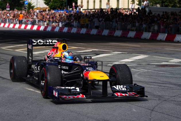 August 15, 2026, RÄÂ«Ga, Latvija: PATRICK FRIESACHER, a former Formula 1 driver, drives the Red Bull RB8 through the streets of Riga as part of the Red Bull Showrun in Riga, Latvia, August 15, 2026. Red Bull Showrun In Riga, Latvia  - ZUMAp305 20260815_zip_p305_003 Copyright: xEdijsxPalensx