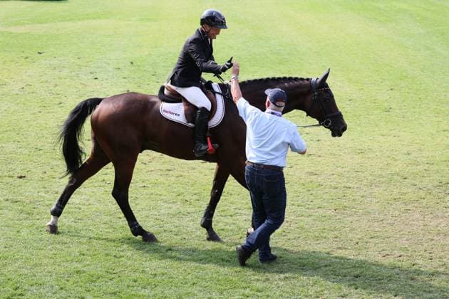 1. Platz, Weltmeister Michael Jung (GER, Deutschland, Germany) mit Pferd fischerChipmunk FRH, Chipmunk FRH, Emotion, Jubel, erster Gratulant Vater Joachim Jung , Vielseitigkeit , FEI Eventing World Championship, WM, Weltmeisterschaft , DHL-Preis, Einzel Mannschaft, AACHEN - FEI World Championships 2026, Weltfest des Pferdesports, Reitsport Weltmeisterschaft 2026, Aachen 2026, Welcome Home 2026, Aachener Soers, 11. bis 23. August 2026, Reitsport, 16.08.2026, Aachen Aachener Soers Deutschland