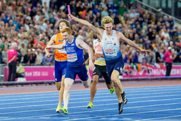 BIRMINGHAM, GREAT BRITAIN - AUGUST 16, 2026 : Charles DOBSON (GBR Great Britain) and Lorenzo BENATI (ITA Italy) competing in the 4x400m relay during the European Athletics Championships at Alexander Stadium on August 16, 2026 in Birmingham, Great Britain. Great Britain Copyright: xLeahxKohringx