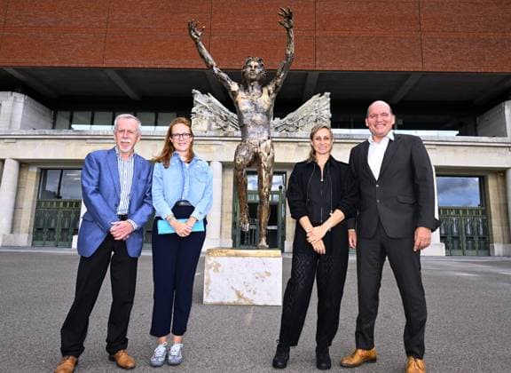 RECORD DATE NOT STATED Wilfried Meert, organizer of the Memorial Van Damme meeting and Wilfried Meert, organizer of the Memorial Van Damme meeting, Florence Frelinx, alderman for sports in the city of Brussels, Kim Gevaert, director of the Allianz Van Damme Memorial and Brussels mayor Philippe Close pose in front of The statue of Ivo Van Damme (Arstist Jan Desmaret) in front of the King Baudouin Stadium during a press conference, PK, Pressekonferenz on the 50th edition of the Memorial Van Damme athletics event in Brussels, Monday 31 August 2026. The 2026 Allianz Memorial Van Damme Diamond League meeting takes place on 04 and 05 September 2026. ERICxLALMAND  x184839108x