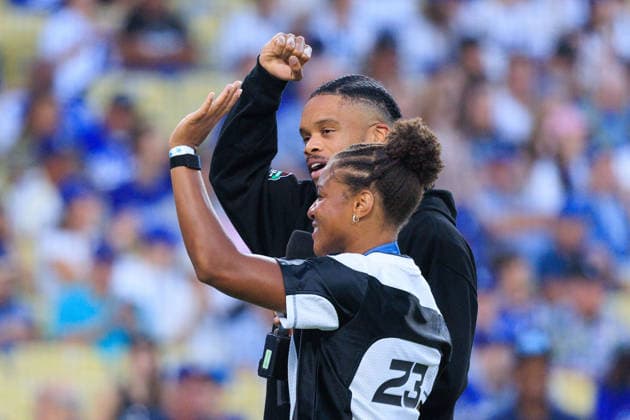 September 4, 2026, Los Angeles, California, USA: Olympic rugby bronze medalist Ariana Ramsey, left, and Paralympic gold medalist in track and field Noah Malone lead the Ã¢â‚¬oeItÃ¢â‚¬â ¢s time for Dodger baseball!Ã¢â‚¬Â cheer before a regular-season MLB, Baseball Herren, USA game between the Los Angeles Dodgers and the Washington Nationals on Friday, Sept. 4, 2026, at Dodger Stadium in Los Angeles, California. JAVIER ROJAS PI Los Angeles USA - ZUMAp124 20260904_zaa_p124_017 Copyright: xJavierxRojasx