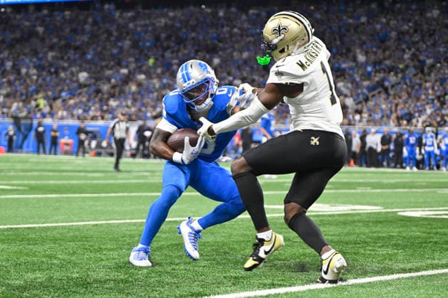 Sep 13, 2026; Detroit, MI, USA; Detroit Lions running back Jahmyr Gibbs (0) stiffarms New Orleans Saints cornerback Kool-Aid McKinstry (1) at Ford Field. Mandatory Credit: -Cal Media Detroit USA - ZUMAc04_ 20260913_zma_c04_284 Copyright: xAllanxDranbergx
