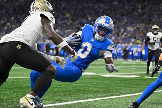 Sep 13, 2026; Detroit, MI, USA; Detroit Lions running back Jahmyr Gibbs (0) twirls and falls on a run at Ford Field. Mandatory Credit: -Cal Media Detroit USA - ZUMAc04_ 20260913_zma_c04_279 Copyright: xAllanxDranbergx