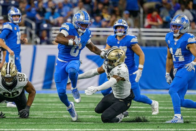 Sep 13, 2026; Detroit, MI, USA; Detroit Lions running back Jahmyr Gibbs (0) stiffarms New Orleans Saints safety Jonas Sanker (7) in overtime at Ford Field. Mandatory Credit: -Cal Media Detroit USA - ZUMAc04_ 20260913_zma_c04_305 Copyright: xAllanxDranbergx