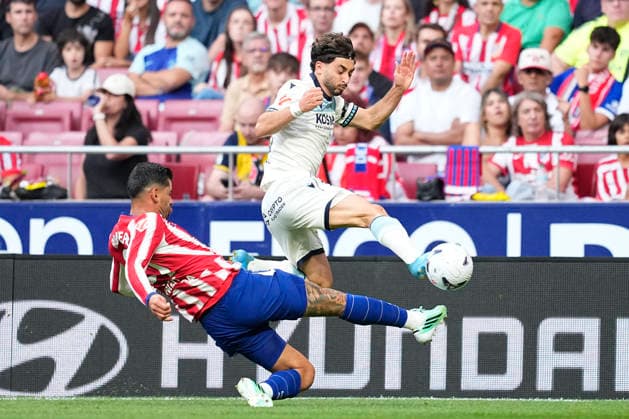 September 16, 2026, Madrid, Madrid, Spain: Raul Moro of CA Osasuna and Cristian Cuti Romero of Atletico de Madrid in action during the Spanish League, LaLiga EA Sports, football match played between Atletico de Madrid and CA Osasuna at Riyadh Air Metropolitano stadium on September 16, 2026, in Madrid, Spain. Madrid Spain - ZUMAa181 20260916_zaa_a181_023 Copyright: xOscarxJ.xBarrosox