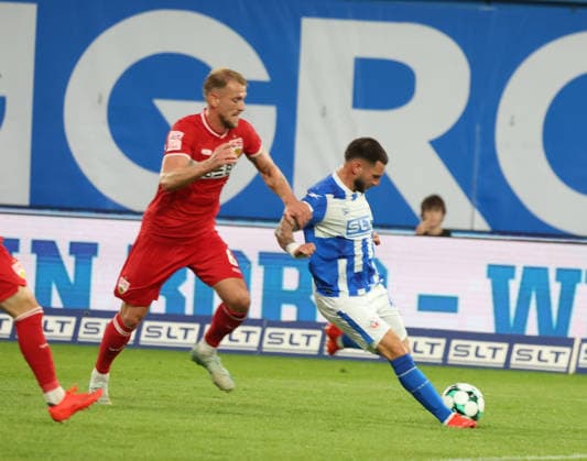 FC Hansa Rostock- VFB Stuttgart II Rostock, 16.09.2026, Fußball 3.Liga FC Hansa Rostock- VFB Stuttgart II Leon Dajuku FC Hansa Rostock vor Alexander Groß Stuttgart II zum 1-0 Rostock Ostseestadion Mecklenburg-Vorpommern Deutschland