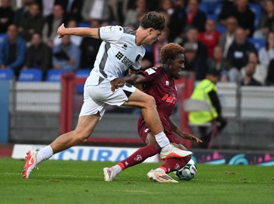 16.09.2026, xophax, Fussball 3.Liga, Fortuna Koeln - SV Wehen Wiesbaden v.l.Max Brandt ( Wehen ) und Romeo Aigbekaen ( Fortuna ) Koeln