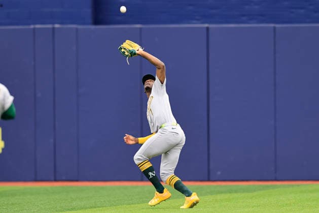 September 17, 2026, St. Petersburg, Florida, USA: Athletics center fielder Denzel Clarke (1) catches a fly ball off the bat of Tampa Bay Rays designated hitter Yandy DoÂ­az (2) during an MLB, Baseball Herren, USA game on September 17, 2026 at Tropicana Field. The Rays beat the Athletics 10-1 and swept the series. St. Petersburg USA - ZUMAh180 20260917_zsp_h180_015 Copyright: xKimxHukarix