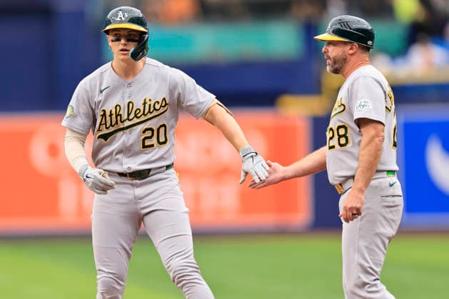 September 17, 2026, St. Petersburg, Florida, USA: Athletics third baseman Zach Gelof (20) singles to center field and gets a low five from first base coach Ryan Christenson (28) during an MLB, Baseball Herren, USA game against the Tampa Bay Rays on September 17, 2026 at Tropicana Field. The Rays beat the Athletics 10-1 and swept the series. St. Petersburg USA - ZUMAh180 20260917_zsp_h180_017 Copyright: xKimxHukarix