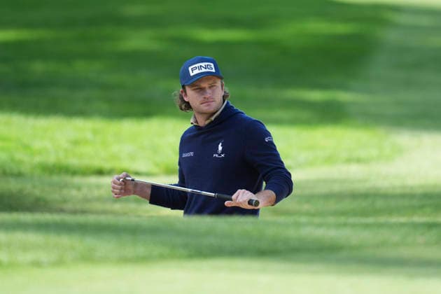 VIRGINIA WATER, ENGLAND - SEPTEMBER 18: Freddy Schott (GER) reacts after he plays from a green side bunker on the 15th hole during Round 2 at the BMW PGA, Golf Herren Championship at Wentworth Golf Club, Virginia Water on September 18, 2026 in Surrey, England The BMW PGA Championship