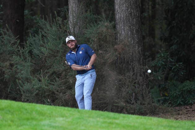 VIRGINIA WATER, ENGLAND - SEPTEMBER 18: Tyrrell Hatton (ENG) chips out of the trees on the 13th hole during Round 2 at the BMW PGA, Golf Herren Championship at Wentworth Golf Club, Virginia Water on September 18, 2026 in Surrey, England The BMW PGA Championship