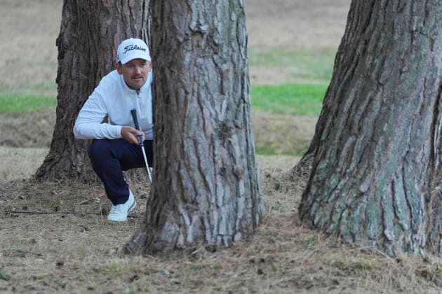 VIRGINIA WATER, ENGLAND - SEPTEMBER 18: Bernd Wiesberger (AUT) looks for a gap between the trees on the 12th hole during Round 2 at the BMW PGA, Golf Herren Championship at Wentworth Golf Club, Virginia Water on September 18, 2026 in Surrey, England The BMW PGA Championship