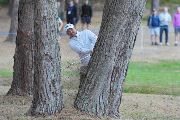 VIRGINIA WATER, ENGLAND - SEPTEMBER 18: Bernd Wiesberger (AUT) plays through a gap between the trees on the 12th hole during Round 2 at the BMW PGA, Golf Herren Championship at Wentworth Golf Club, Virginia Water on September 18, 2026 in Surrey, England The BMW PGA Championship