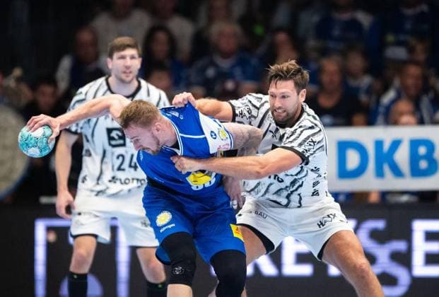 HANDBALL OPEL HBL 5. SPIELTAG THSV EISENACH - THW KIEL ** NUR FÜR REDAKTIONELLE ZWECKE ** EDITORIAL USE ONLY **<p>18 09 2026-Eisenach: Handball Opel Handball 1. Bundesliga Saison 2026 - 2027 Werner Assmann Halle 5. Spieltag ThSV Eisenach - THW Kiel im Foto: Dominik Solak 30 (ThSV Eisenach) im Zweikampf mit Harald Reinkind 6 (THW Kiel)2 ( Deutschland Thueringen Eisenach Copyright: SaschaxFromm