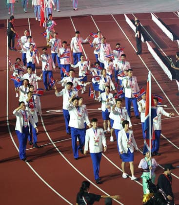 (260919) -- NAGOYA, Sept. 19, 2026 -- The delegation of the Democratic People s Republic of Korea parades during the opening ceremony of the 20th Asian Games Aichi-Nagoya 2026 in Nagoya, Japan, Sept. 19, 2026. ) (SP)JAPAN-NAGOYA-ASIAN GAMES-OPENING CEREMONY YaoxQilin 
