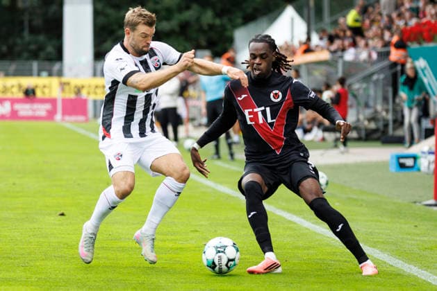 KOELN, GERMANY - SEPTEMBER 19, 2026: Yannick Deichmann (FC Ingolstadt, 20), Yannick Tonye (Viktoria Köln, 7) tackling during the 3rd division match on gameday 7 between Viktoria Koeln vs. FC Ingolstadt at the Sportpark Hoehenberg on September 19, 2026 in Koeln, Germany. DFL REGULATIONS PROHIBIT ANY USE OF PHOTOGRAPHS AS IMAGE SEQUENCES AND OR QUASI-VIDEO. Nordrhein-Westfalen Germany Copyright: xAxelxKohringx
