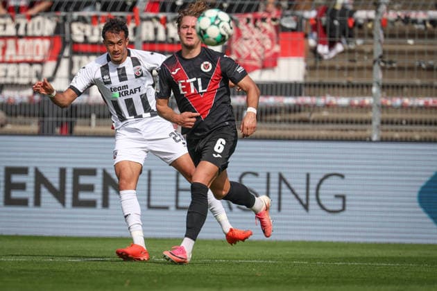 3. Liga - Saison 2026 27 - Victoria Köln - FC Ingolstadt 04 - Nishan Velupillay (Nr.28 - FCI) - Tobias Eisenhut (Nr.6 - Viktoria Köln) - Foto: Meyer Jürgen 3. Liga - Saison 2026 27 - Victoria Köln - FC Ingolstadt 04