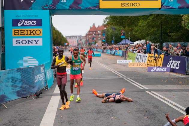 World Championship, WM, Weltmeisterschaft in 5 km: World Athletics Road Running Championships Copenhagen Jakob Ingebrigtsen of Norway, lying on the ground, after the five-kilometer distance during the World Athletics Road Running Championships Copenhagen in Copenhagen, Saturday, September 19, 2026. (Photo: Emil Helms Scanpix 2026) , Copenhagen Denmark Copyright: EmilxHelmsx spdk20260919-150938-L