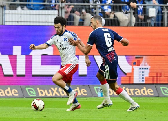 19.09.2026,GER Fußball, Männer, 1.BL, Spieltag 4 , Saison 2026 2027, Hamburg, Hamburger SV vs 1.FC Köln Zakaria El Ouahdi (HSV 07) versucht sich gegen Ellyes Skhiri(Köln 06) durchzusetzen DFB DFL regulations prohibit any use of photographs as image sequences and or quasi-video) Hamburg Volksparkstadion Hamburg Deutschland Copyright: xnordphotoxGmbH xWitkex