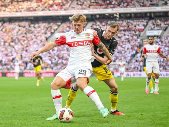 Finn Jeltsch (VfB Stuttgart) und Maximilian Beier (Borussia Dortmund) im Zweikampf waehrend des spiels der 1. Bundesliga zwischen VfB Stuttgart und Borussia Dortmund, MHPArena am 19. September 2026 in Stuttgart, Deutschland. (Foto von Harry Langer DeFodi Images) +++ Finn Jeltsch (VfB Stuttgart) und Maximilian Beier (Borussia Dortmund) battle for the ball during the Bundesliga match between VfB Stuttgart and Borussia Dortmund at MHPArena on September 19, 2026 in Stuttgart, Germany. (Photo by Harry Langer DeFodi Images) DFB DFL REGULATIONS PROHIBIT ANY USE OF PHOTOGRAPHS AS IMAGE SEQUENCES AND OR QUASI-VIDEO. (Photo by Harry Langer DeFodi Images) DFB DFL REGULATIONS PROHIBIT ANY USE OF PHOTOGRAPHS AS IMAGE SEQUENCES AND OR QUASI-VIDEO. -