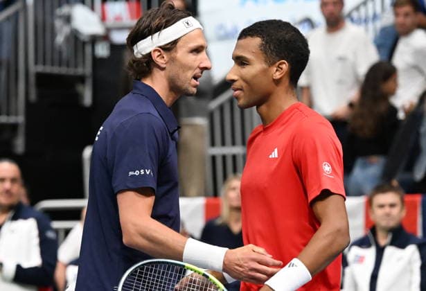 September 19, 2026, Quebec, Pq, Canada: Felix Auger-Aliassime of Canada, right, is congratulated by Arthur Rinderknech of France after winning the fourth match at the Davis Cup qualifier second round at the Videotron Centre in Quebec City, Saturday, Sept. 19, 2026. Canada News - September 19, 2026  - ZUMAc35_ 20260919_zaf_c35_142 Copyright: xJacquesxBoissinotx