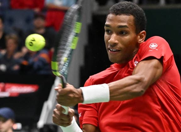 September 19, 2026, Quebec, Pq, Canada: Felix Auger-Aliassime of Canada plays a return to Arthur Rinderknech of France during the fourth match at the Davis Cup qualifier second round match at the Videotron Centre in Quebec City, Saturday, Sept. 19, 2026. Canada News - September 19, 2026  - ZUMAc35_ 20260919_zaf_c35_149 Copyright: xJacquesxBoissinotx