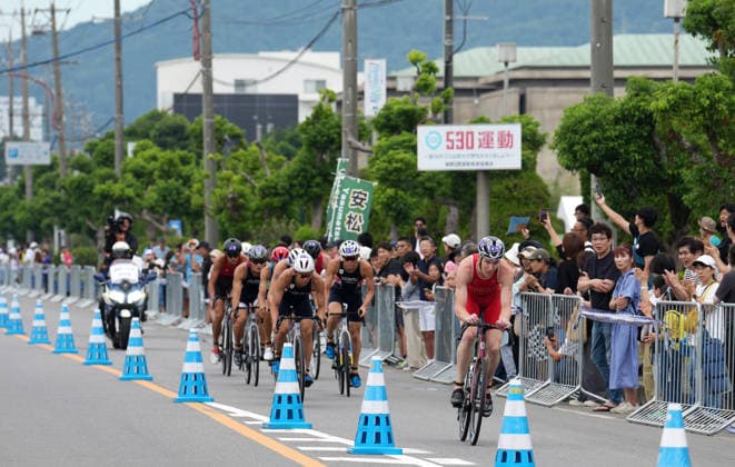 (260920) -- NAGOYA, Sept. 20, 2026 -- Athletes compete during the men s individual triathlon at the 20th Asian Games Aichi-Nagoya 2026 in Gamagori City of Aichi prefecture, Japan, Sept. 20, 2026. ) (SP)JAPAN-NAGOYA-ASIAN GAMES-TRIATHLON-MEN S CenxYunpeng