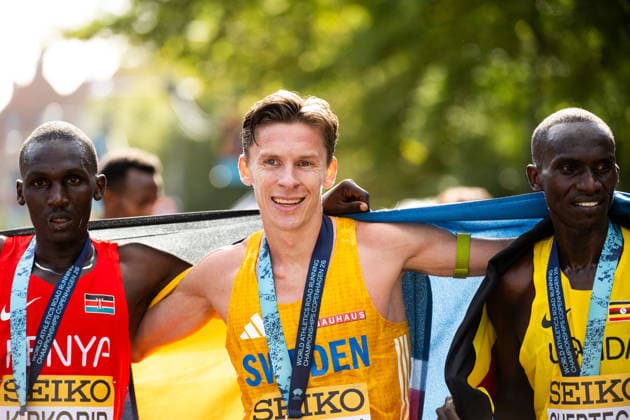 260920 Nicholas Kipkorir of Kenya, Andreas Almgren of Sweden and Tadese Worku of Ethiopia celebrate after the Copenhagen Half Marathon in the World Athletics Road Running Championships on September 20, 2026 in Copenhagen. Photo: Mathilda Schuler BILDBYRAN kod MA MA1036 friidrott athletics friidrett world athletics road running championships copenhagen half marathon 2026 bbeng half maratho jubel Copyright: MATHILDAxSCHULER BB260920MA047
