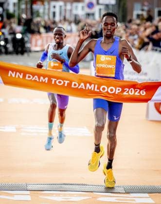 ZAANDAM - Athlete Jamal Kiprono crosses the finish line first at the Dam tot Damloop on the Burcht. Tens of thousands of people participated on the 10-mile (16.1 km) course. ROBIN UTRECHT ANP netherlands out - belgium out Zaandam xVIxxIVx 569370503 originalFilename: 0867329692st.jpg
