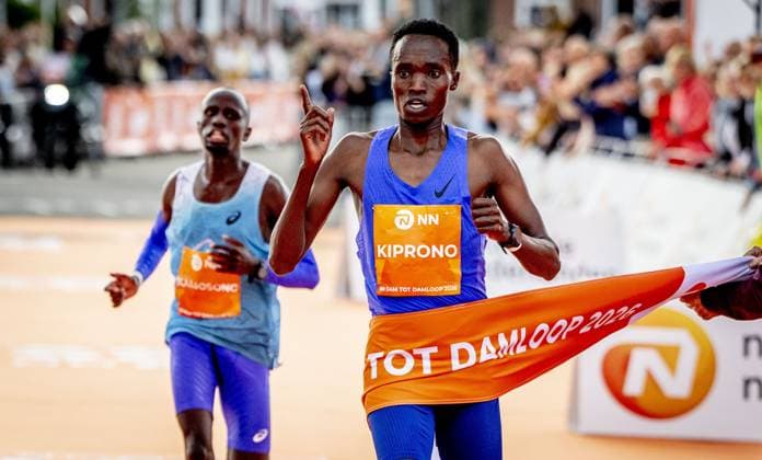 ZAANDAM - Athlete Jamal Kiprono crosses the finish line first at the Dam tot Damloop on the Burcht. Tens of thousands of people participated on the 10-mile (16.1 km) course. ROBIN UTRECHT ANP netherlands out - belgium out Zaandam xVIxxIVx 569370507 originalFilename: 0867329694st.jpg