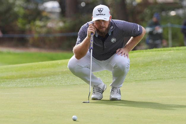 VIRGINIA WATER, ENGLAND - SEPTEMBER 20: Tyrrell Hatton (ENG) lines up a putt on the sixth green during Round 4 at the BMW PGA, Golf Herren Championship at Wentworth Golf Club, Virginia Water on September 20, 2026 in Surrey, England The BMW PGA Championship