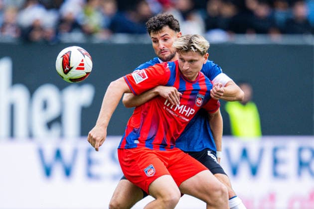 Sport Bilder des Tages 20.09.2026 - Fußball, 2026 2027, 2. Bundesliga, 6. Spieltag, DSC Arminia Bielefeld - 1. FC Heidenheim: (L-R) Maximilian Bauer (Bielefeld), Alessandro Vogt (Heidenheim) DFL REGULATIONS PROHIBIT ANY USE OF PHOTOGRAPHS AS IMAGE SEQUENCES AND OR QUASI-VIDEO.