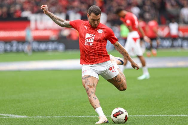 David Raum (RB Leipzig) beim aufwaermen waehrend des Spiels der 1. Bundesliga zwischen Bayer 04 Leverkusen und RB Leipzig, BayArena am 20. September 2026 in Leverkusen, Deutschland. (Foto von Oliver Kaelke DeFodi Images) +++ David Raum (RB Leipzig) warm(s) up during the Bundesliga match between Bayer 04 Leverkusen and RB Leipzig at BayArena on September 20, 2026 in Leverkusen, Germany. (Photo by Oliver Kaelke DeFodi Images) DFB DFL REGULATIONS PROHIBIT ANY USE OF PHOTOGRAPHS AS IMAGE SEQUENCES AND OR QUASI-VIDEO. (Photo by Oliver Kaelke DeFodi Images) -