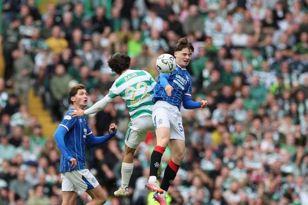 Mika Baur of Celtic jumps into Findlay Curtis of Rangers during the William Hill Scottish Premiership match at Parkhead, Glasgow. Celtic v Rangers - William Hill Scottish Premiership - Parkhead, Glasgow, Lanarkshire, Scotland, UK - 20 Sep 2026Glasgow Parkhead Lanarkshire United Kingdom  Copyright: xO Rourke RangersxFC Shutterstockx 17159973ex