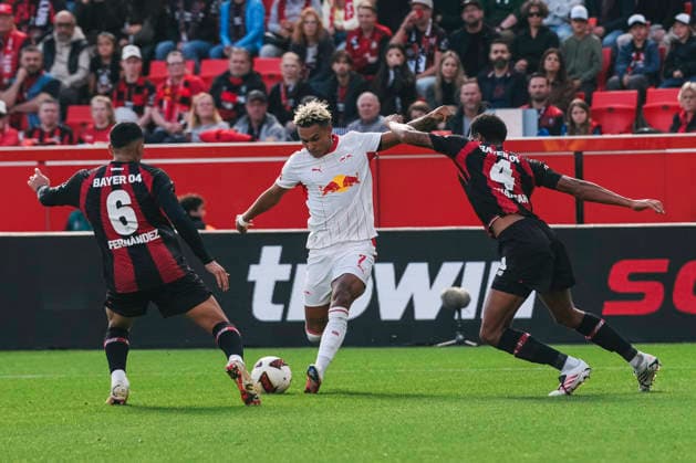 20.09.2026, xjmrgnx, Fussball 1.Bundesliga, Bayer 04 Leverkusen - RB Leipzig v.l. Schussversuch von Antonio Nusa (7, Leipzig) gegen Equi Fernandez (6, Leverkusen) und Jarell Quansah (4, Leverkusen) (DFL DFB REGULATIONS PROHIBIT ANY USE OF PHOTOGRAPHS as IMAGE SEQUENCES and or QUASI-VIDEO) Leverkusen