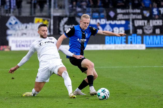 v.li.: Felix Higl (Münster, 33), Julian Rieckmann (SV Waldhof, 21), Zweikampf, Spielszene, Duell, duel, tackle, tackling, Dynamik, Action, Aktion, 20.09.2026, Mannheim (Deutschland), Fussball, 3. Liga, SV Waldhof Mannheim - SC Preußen Münster, DFB DFL REGULATIONS PROHIBIT ANY USE OF PHOTOGRAPHS AS IMAGE SEQUENCES AND OR QUASI-VIDEO.