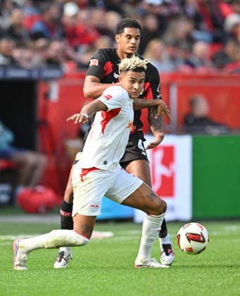 (l-r) Jarell Quansah (Bayer Leverkusen), Antonio Nusa (RB Leipzig) Aktion, Zweikampf, Fussball 1. Bundesliga, 4.Spieltag, Bayer 04 Leverkusen - RB Leipzig, am 20.09.2026 in Leverkusen Deutschland. DFL regulations prohibit any use of photographs as image sequences and or quasi-video Ã‚Â