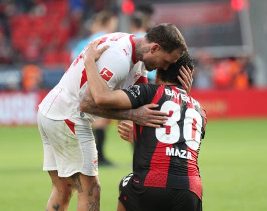 20.09.2026; Fussball; GER; Saison 2026 2027 ; 1.Bundesliga; 4.Spieltag. : Bayer 04 Leverkusen --- RB Leipzig : Nach Spielschluss werden Freundlichkeiten ausgetauscht zwischen : David Raum (22 RBL) und Ibrahim Maza (30 B04). DFL REGULATIONS PROHIBIT ANY USE OF PHOTOGRAPHS AS IMAGE SEQENCES AND OR QUASI-VIDEO. 1.Fussball-Bundesliga : 20.09.2026 Fussball; GER; Saison 2026 2027 ; 1.Bundesliga; 4. Spieltag. Bayer 04 Leverkusen--RB Leipzig :