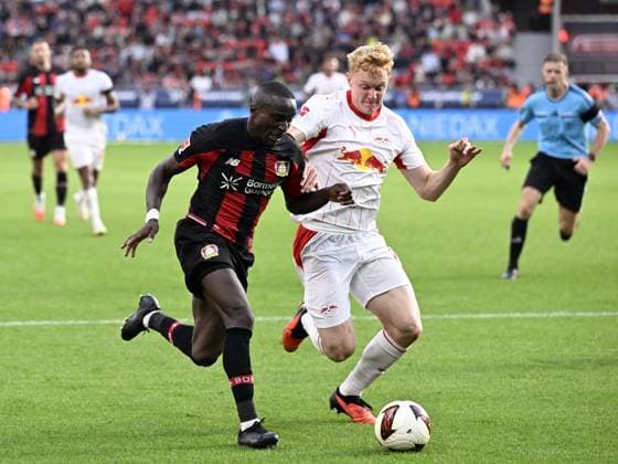 LEVERKUSEN - (lr) Moussa Diaby of Bayer 04 Leverkusen, Nicolas Seiwald of RB Leipzig during the match between Bayer 04 Leverkusen and RB Leipzig at the Bay Arena on 20 September 2026 in Leverkusen, Germany. ANP Bundesliga 2026 27 xVIxANPxSportx xGerritxvanxKeulenxIVx 569419672 originalFilename: 569419672.jpg