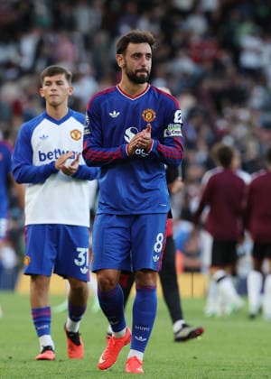 20th September 2026; Craven Cottage, London, England; Premier League Football, Fulham versus Manchester United, ManU Bruno Fernandes of Manchester United applauding the Manchester United fans after the match with Shea Lacey of Manchester United behind him JohnxPatrickxFletcher
