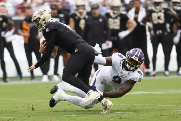 New Orleans Saints quarterback Tyler Shough (6) under pressure by Baltimore Ravens linebacker Zion Young (9). Sep 20, 2026; Baltimore, MD, USA; at M&T Bank Stadium. Mandatory Credit: -Cal Media Baltimore USA - ZUMAc04_ 20260920_zma_c04_027 Copyright: xMikexBuscherx