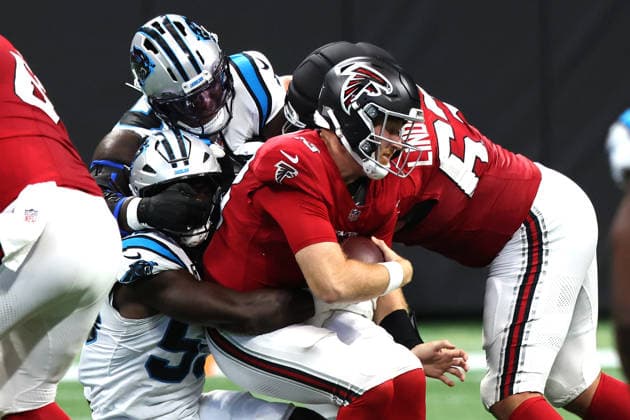 ATLANTA, GA - SEPTEMBER 20: Starting quarterback Cooper Rush (13) of the Atlanta Falcons is sacked during the Sunday afternoon NFL, American Football Herren, USA game between the Atlanta Falcons and the Carolina Panthers on September 20, 2026 at the Mercedes-Benz Stadium in Atlanta, Georgia. (Photo by David J. Griffin Icon Sportswire) NFL: SEP 20 Panthers at Falcons EDITORIAL USE ONLY Icon9532609200455