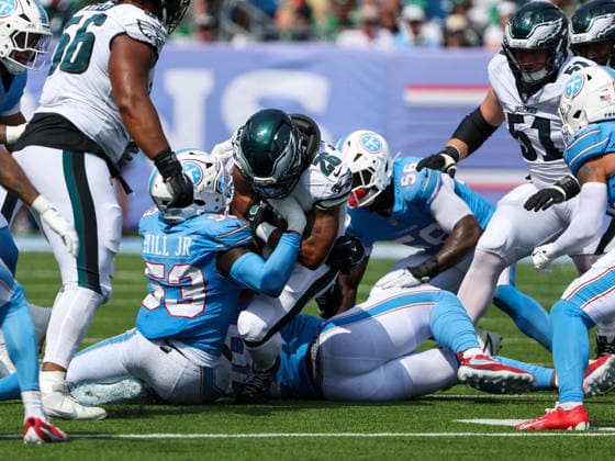 Sep 20, 2026; Nashville, TN, USA; Philadelphia Eagles running back Saquon Barkley (26) is stopped by Tennessee Titans linebacker Anthony Hill Jr. (53) during the NFL, American Football Herren, USA regular season game between the Philadelphia Eagles and Tennessee Titans at Nissan Stadium. Mandatory Credit: -Cal Media NFL 2026: Eagles Vs Titans SEP 20  - ZUMAc04_ 20260920_zma_c04_071 Copyright: xStephenxFurstx