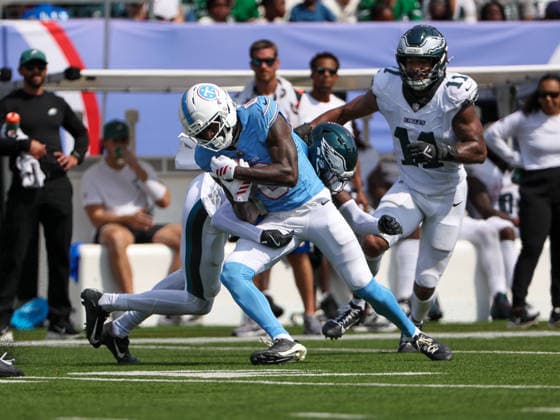 Sep 20, 2026; Nashville, TN, USA; Tennessee Titans wide receiver Calvin Ridley (0) is tackled by Philadelphia Eagles cornerback Riq Woolen (2) after making a catch during the NFL, American Football Herren, USA regular season game between the Philadelphia Eagles and Tennessee Titans at Nissan Stadium. Mandatory Credit: -Cal Media NFL 2026: Eagles Vs Titans SEP 20  - ZUMAc04_ 20260920_zma_c04_075 Copyright: xStephenxFurstx