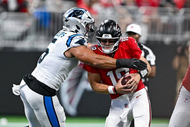 ATLANTA, GA - SEPTEMBER 20: Carolina linebacker Jaelan Phillips (5) hits Atlanta quarterback Jack Strand (18) during the NFL, American Football Herren, USA game between the Carolina Panthers and the Atlanta Falcons on September 20th, 2026 at Mercedes-Benz Stadium in Atlanta, GA. (Photo by Rich von Biberstein Icon Sportswire) NFL: SEP 20 Panthers at Falcons EDITORIAL USE ONLY Icon260920047
