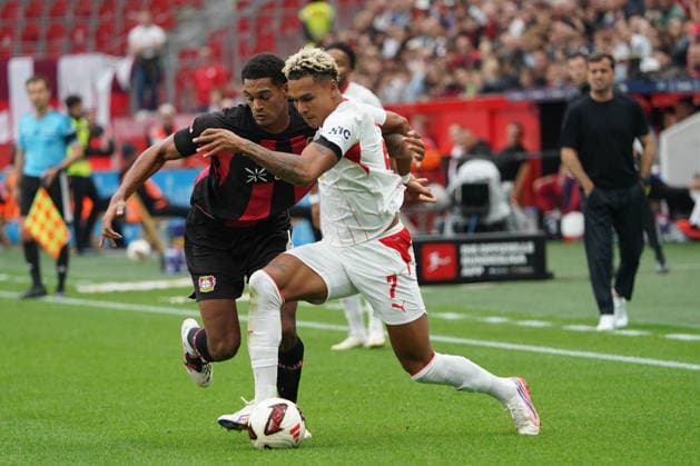 Leverkusen Fussball, 1.BL saison 2026 2027 Bayer 04 Leverkusen vs RB Leipzig, 20.09.2026, Bayarena Leverkusen Jarell Quansah Bayer 04 Leverkusen, Grossbritannien Great Britain, GB , Antonio Nusa, RB Leipzig,