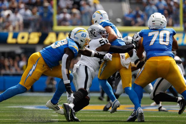 INGLEWOOD, CA - SEPTEMBER 20: Las Vegas Raiders defensive end Malcolm Koonce (51) sacks Los Angeles Chargers quarterback Justin Herbert (10) during the NFL, American Football Herren, USA game between the Las Vegas Raiders and the Los Angeles Chargers on September 20, 2026, at SoFi Stadium in Inglewood, CA. (Photo by Jevone Moore Icon Sportswire) NFL: SEP 20 Raiders at Chargers EDITORIAL USE ONLY Icon260920864