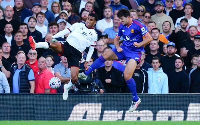 Harry Maguire of Manchester United, ManU and Shea Charles of Fulham Fulham v Manchester United, Premier League, Football, Craven Cottage, London, UK - 20 Sep 2026London Craven Cottage United Kingdom EDITORIAL USE ONLY No use with unauthorised audio, video, data, fixture lists, club league logos or live services. Online in-match use limited to 120 images, no video emulation. No use in betting, games or single club league player publications.  Copyright: xJavierxGarcia Shutterstockx 17160117fa